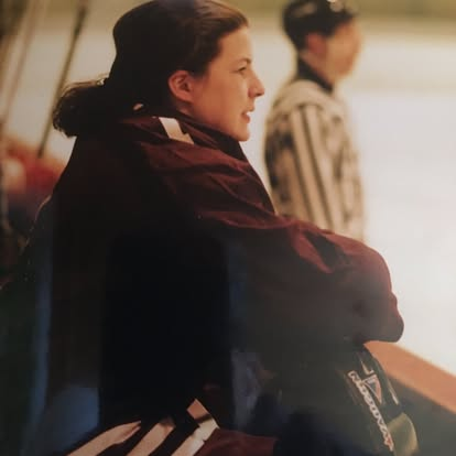 Young Alex at Philips Exeter as a female ice hockey goalie.